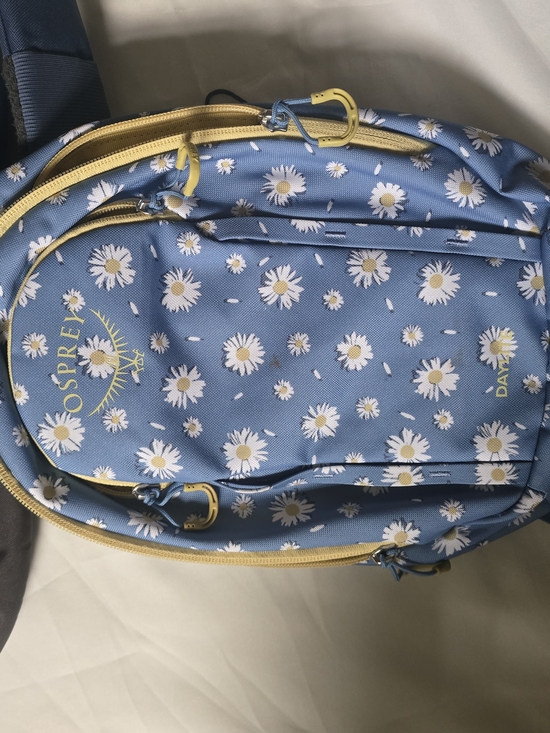 OSPREY Handbags - OSPREY Daylite Backpack in Blue Daisy Print with Yellow Accents